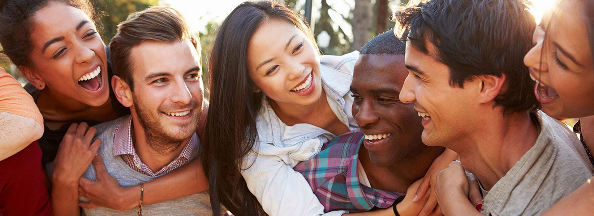 Group Of Friends Having Fun Together Outdoors